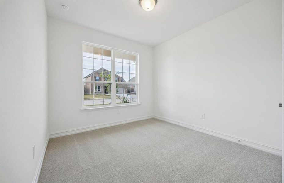 Comfortable bedroom with a bright window view