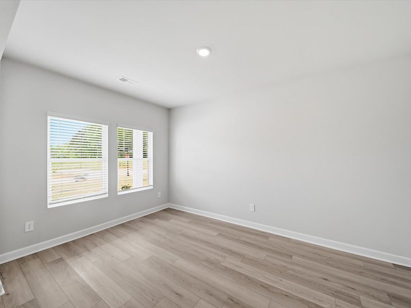 Spacious, unfurnished interior of a new home in The Farm at Wells Creek - Signature Collection, Gray Court (Image 8). Spacious, unfurnished interior of a new home in The Farm at Wells Creek - Signature Collection, Gray Court (Image 8).