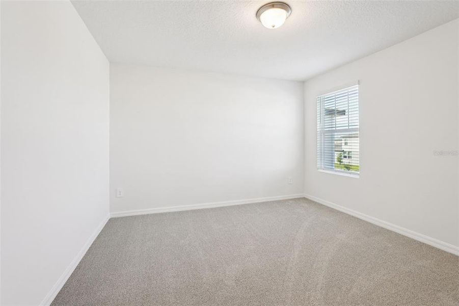 Spacious, unfurnished interior of a new home in The Meadow at Crossprairie, St. Cloud (Image 12).