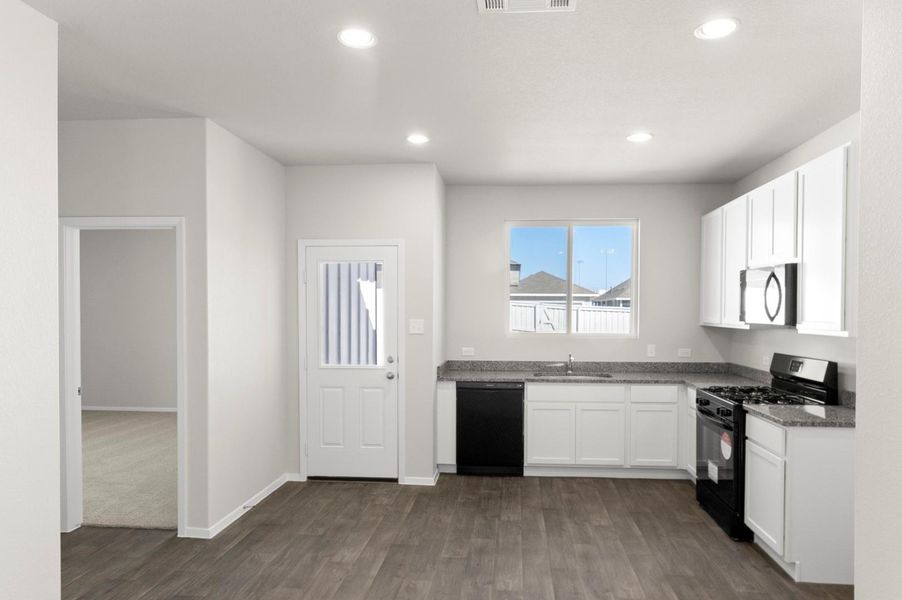 Furnished interior view inside a new home in Casetta Ranch, Kyle (Image 13).