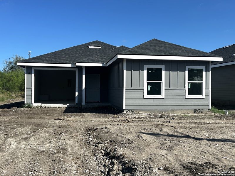 Front exterior of a new home in , Beeville, TX, highlighting curb appeal (Image 5).