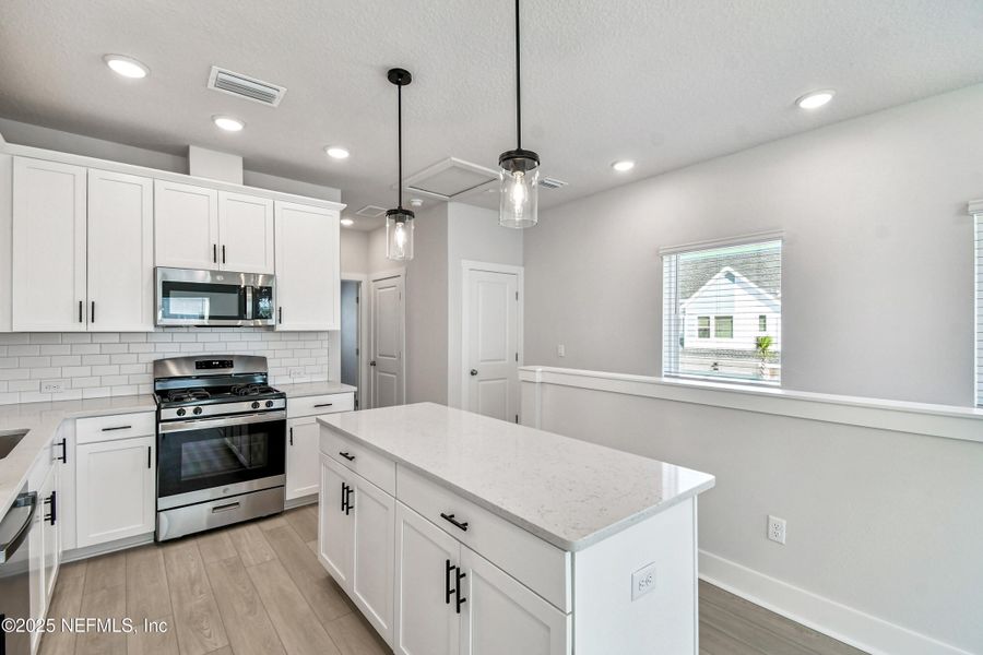 Furnished interior view inside a new home in Kettering at eTown - Garden Collection, Jacksonville (Image 6). Furnished interior view inside a new home in Kettering at eTown - Garden Collection, Jacksonville (Image 6).