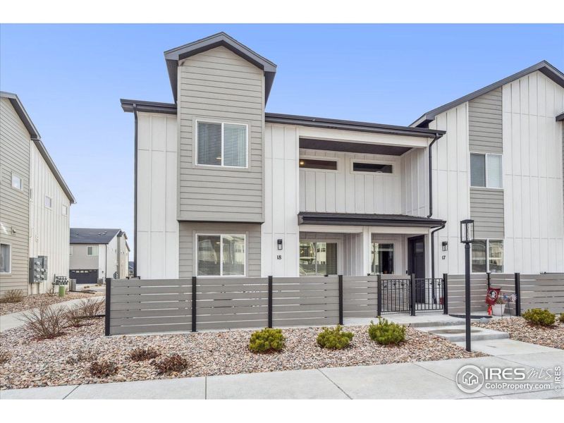 Front exterior of a new home in , Greeley, CO, highlighting curb appeal (Image 1).