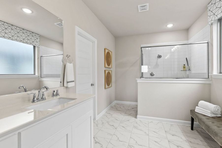 Primary Bathroom in the Wimbledon home plan by Trophy Signature Homes – REPRESENTATIVE PHOTO