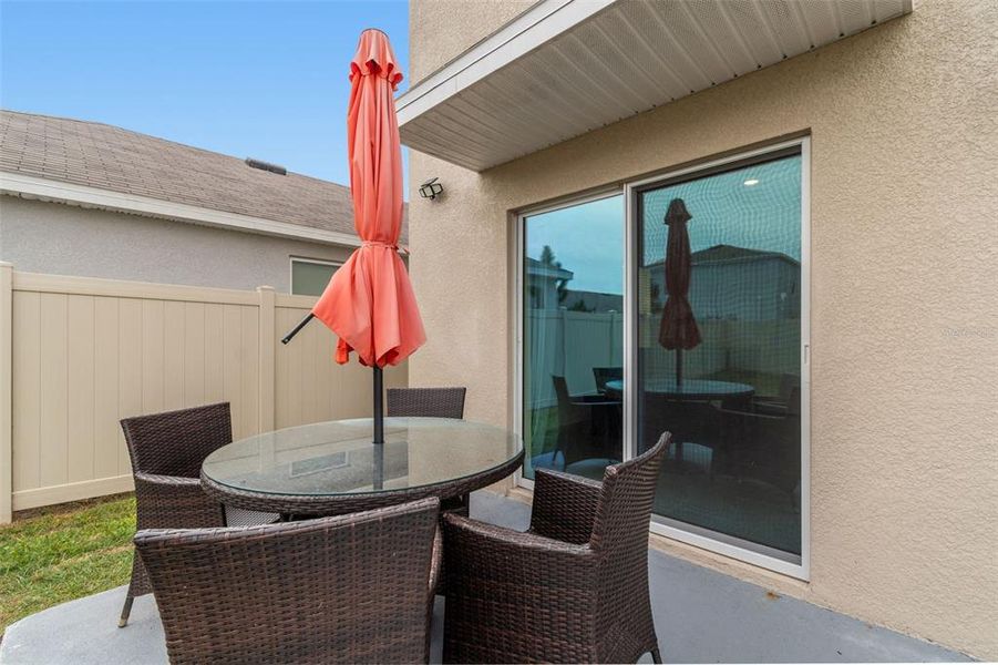 Exterior details and patio area of a home in Westgate at Avalon Park, Wesley Chapel (Image 38).