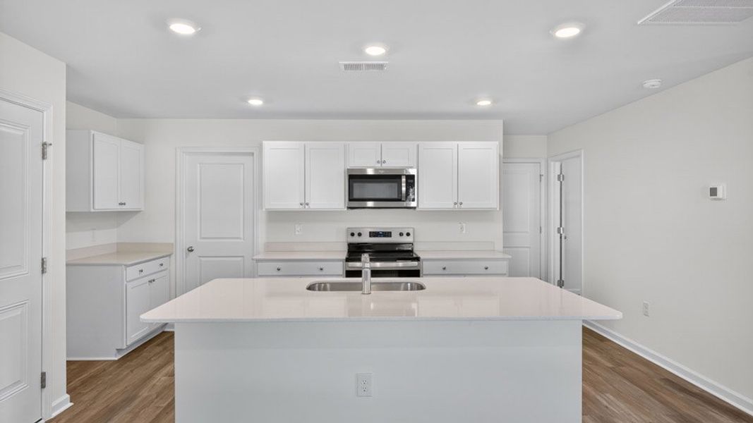 Furnished interior view inside a new home in Fishel Village, Winston-Salem (Image 4). Furnished interior view inside a new home in Fishel Village, Winston-Salem (Image 4).