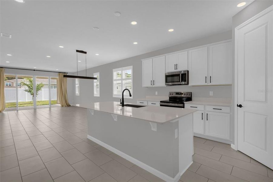 Furnished interior view inside a new home in Seasons at Lakeside Forest, Tavares (Image 30).