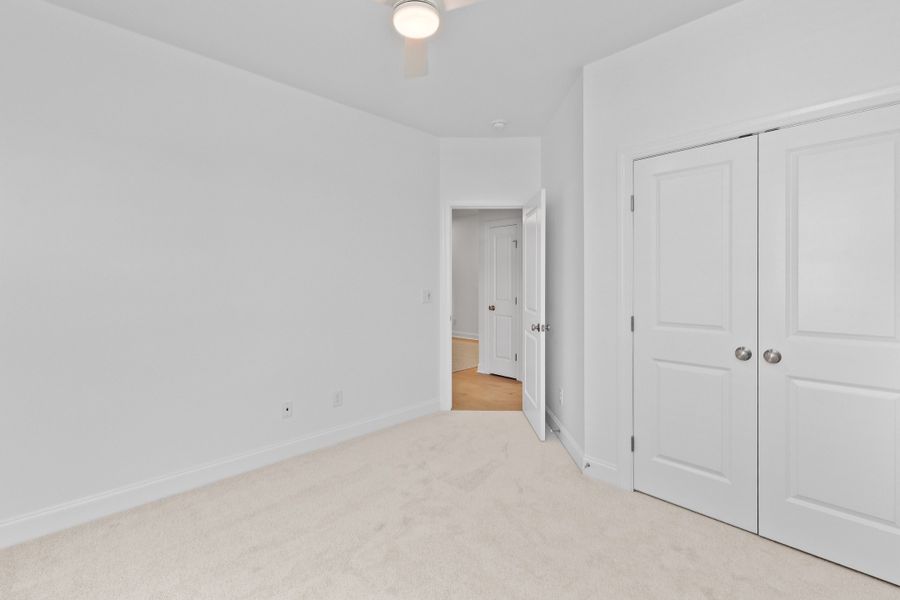 Representative unfurnished interior of a home built from the The Juniper by RobuckHomes in Kennebec Crossing, Angier (Image 82).