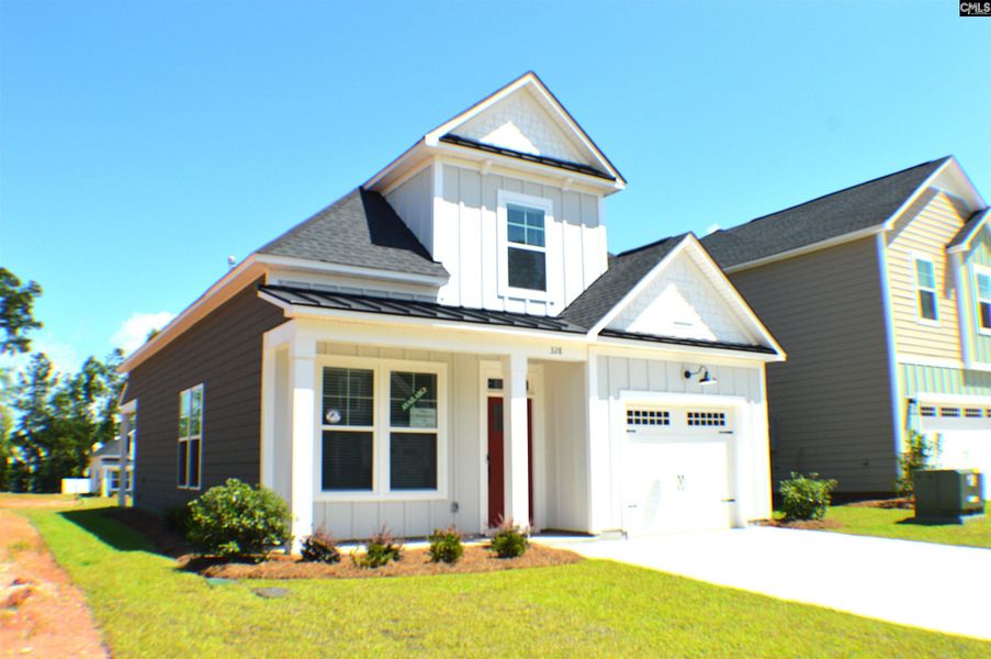 Front exterior of a new home in Bickley Station, Irmo, SC, highlighting curb appeal (Image 21). Front exterior of a new home in Bickley Station, Irmo, SC, highlighting curb appeal (Image 21).