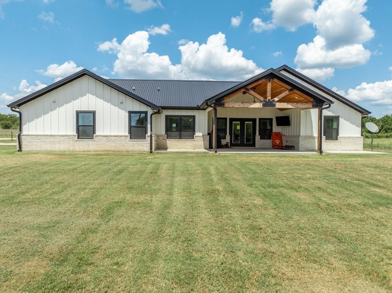 Front exterior of a new home in , Rockdale, TX, highlighting curb appeal (Image 21).