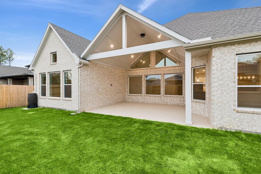 Exterior details and patio area of a home in ARTAVIA 65' Homesites, Conroe (Image 26).