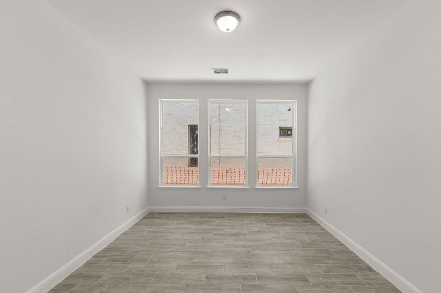 Representative unfurnished interior of a home built from the Grayson by UnionMain Homes in Cambridge Crossing, Celina (Image 34).