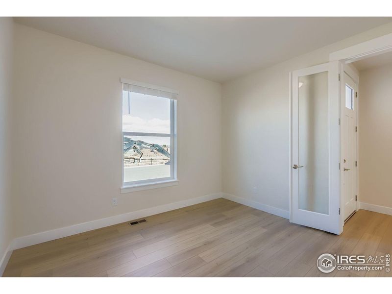 Spacious, unfurnished interior of a new home in RainDance National 60/70, Windsor (Image 18).