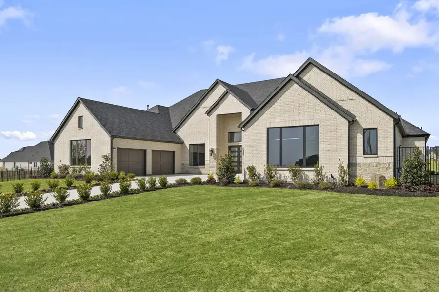 Representative exterior photo of a completed home built from the Lancaster by Windsor Homes in Ridge Pointe Estates, McLendon-Chisholm, TX (Image 2). Representative exterior photo of a completed home built from the Lancaster by Windsor Homes in Ridge Pointe Estates, McLendon-Chisholm, TX (Image 2).