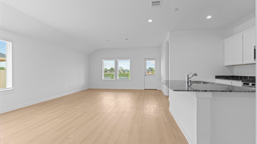 Representative unfurnished interior of a home built from the Caden by D.R. Horton in Caldwell Crossing, Iowa Colony (Image 16).