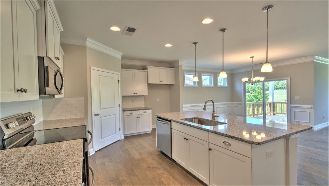 Representative furnished interior of a home built from the ARLINGTON DRHe by D.R. Horton in Valley View, Waynesville (Image 8).