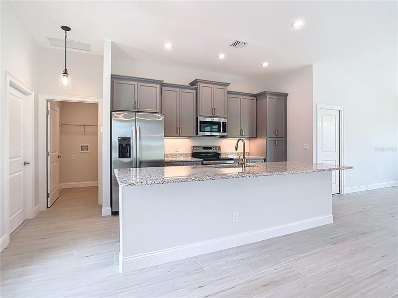Furnished interior view inside a new home in , Port Charlotte (Image 5).