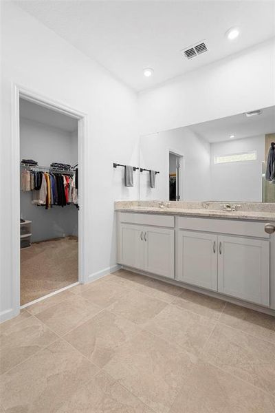 Primary bath with walk-in closet