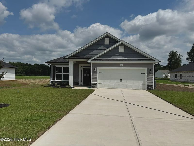 Front exterior of a new home in Blair Ridge, La Grange, NC, highlighting curb appeal (Image 2). Front exterior of a new home in Blair Ridge, La Grange, NC, highlighting curb appeal (Image 2).