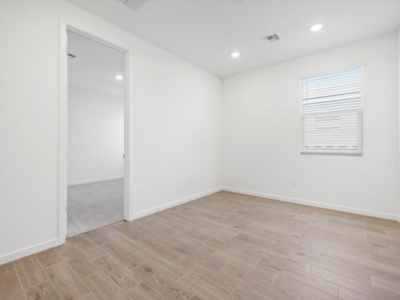 Spacious, unfurnished interior of a new home in Rancho Mirage Estate Series, Maricopa (Image 11).