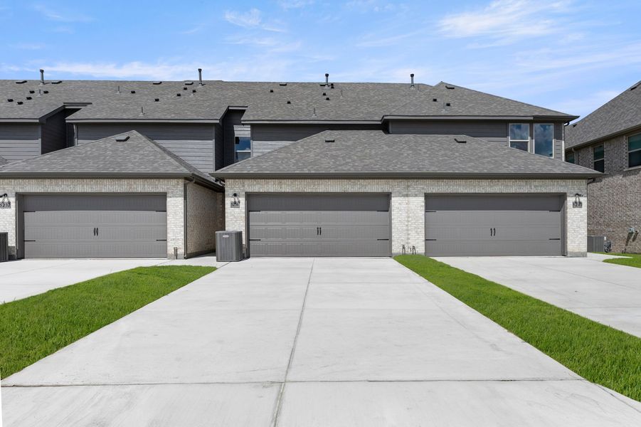 Front exterior of a new home in Creekshaw, Royse City, TX, highlighting curb appeal (Image 27).