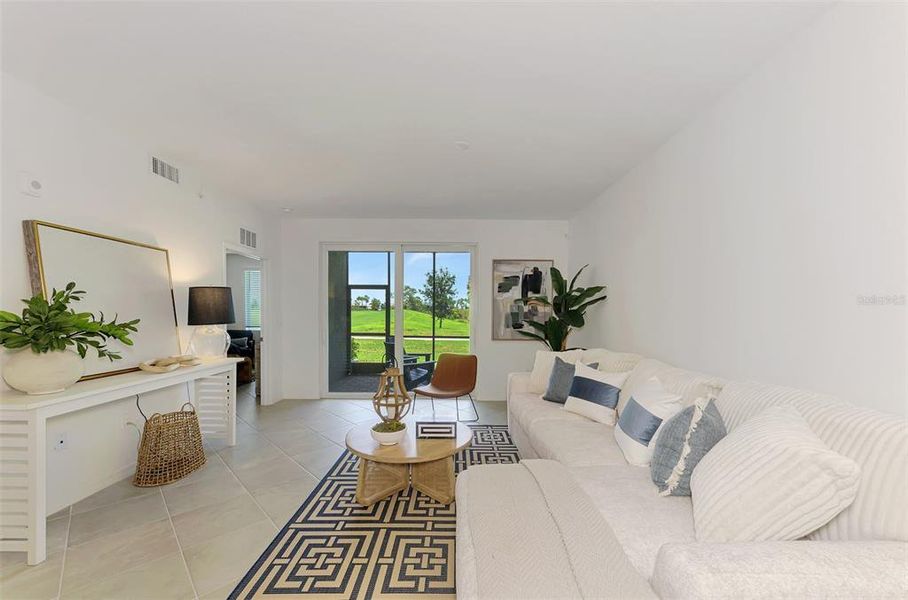 Furnished interior view inside a new home in Wellen Park Golf & Country Club, Venice (Image 36).