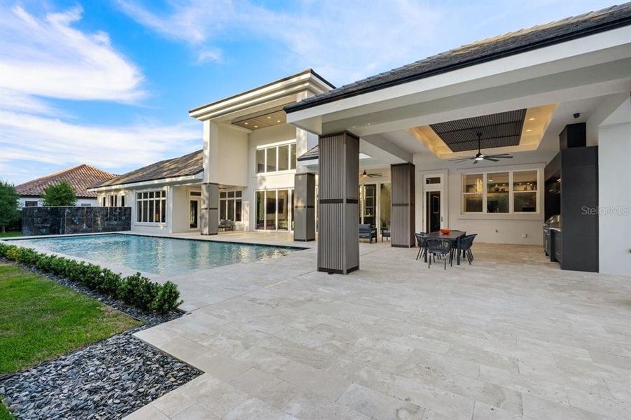 Exterior details and patio area of a home in , Ormond Beach (Image 31).