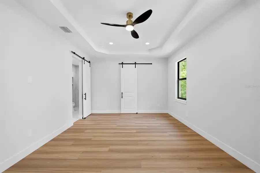 Spacious, unfurnished interior of a new home in , Brooksville (Image 17).