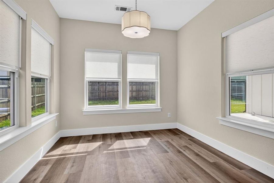 Plenty of natural lightning for overlooking the backyard and swimming pool to view and have seperate space for the dining room.  Semi gloss paint throughout the house and easier for wiping and cleaning the walls.  High base boards for easier cleaning the for homeowners.  Just simply take the broom and brush the baseboards for easier maintenance house keeping.