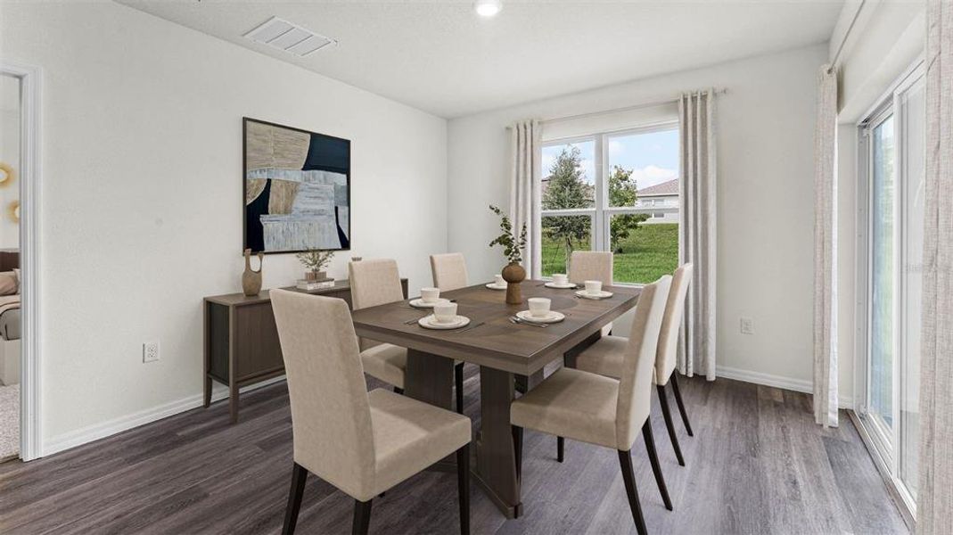 Furnished interior view inside a new home in Crossroads at Kelly Park, Apopka (Image 4). Furnished interior view inside a new home in Crossroads at Kelly Park, Apopka (Image 4).