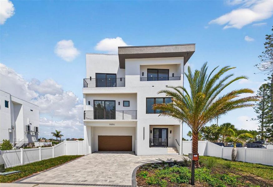 Front exterior of a new home in , Treasure Island, FL, highlighting curb appeal (Image 30).