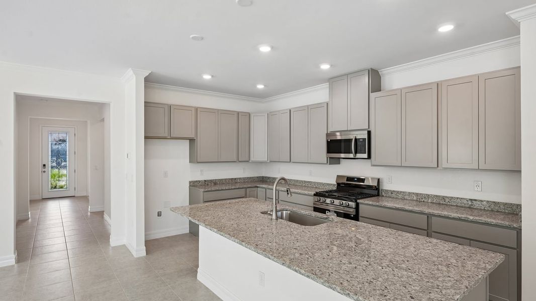 Furnished interior view inside a new home in Heritage Station, Punta Gorda (Image 5).