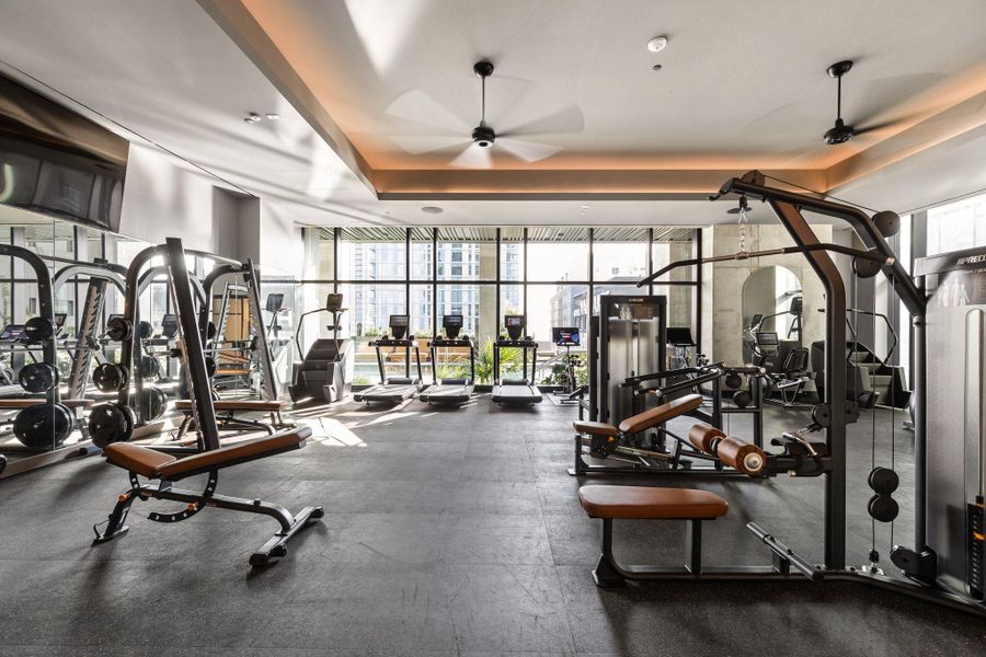 Drop that gym membership! Fitness Center Featuring Cardio Equipment With On-demand Classes + Personal Training Area