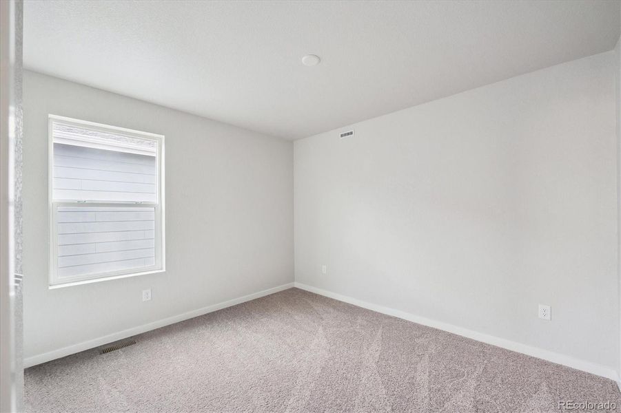 Spacious, unfurnished interior of a new home in Farmlore, Brighton (Image 23). Spacious, unfurnished interior of a new home in Farmlore, Brighton (Image 23).