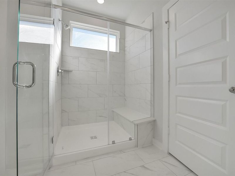 Furnished interior view inside a new home in Sunterra, Katy (Image 15).