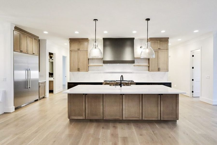 Representative furnished interior of a home built from the Thomastown by Riverstone Construction, LLC in River Gorge Ranch, Guild (Image 7).