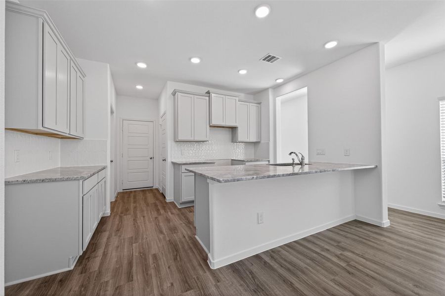 Furnished interior view inside a new home in Enclave at Willis, Willis (Image 8).