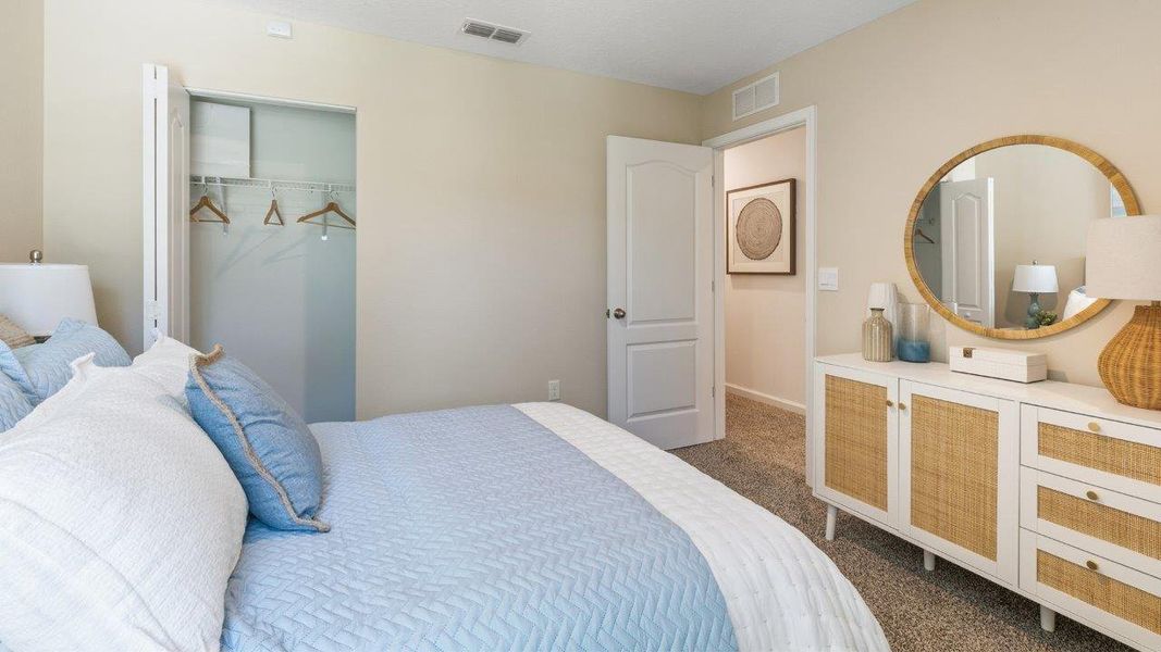 Representative furnished interior of a home built from the GREYSON by D.R. Horton in Hansen Creek, Jacksonville (Image 19).