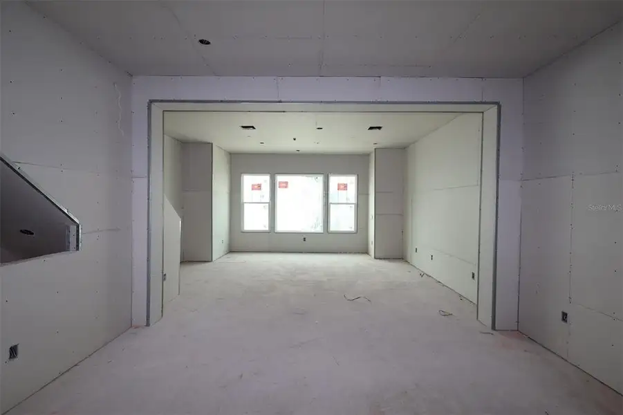 In-progress construction of a new home in Towns at Union, St. Petersburg, FL (Image 10).