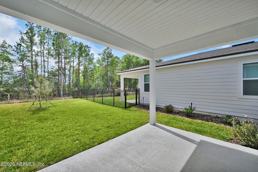 Exterior details and patio area of a home in Hyland Trail, Green Cove Springs (Image 25).