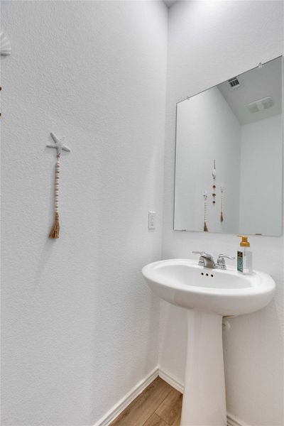 Half Bathroom next to Laundry room downstairs. Half Bathroom next to Laundry room downstairs.