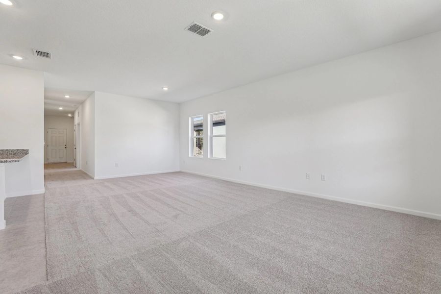 Representative unfurnished interior of a home built from the Halo by Starlight Homes in Hawks Run, Kissimmee (Image 16).