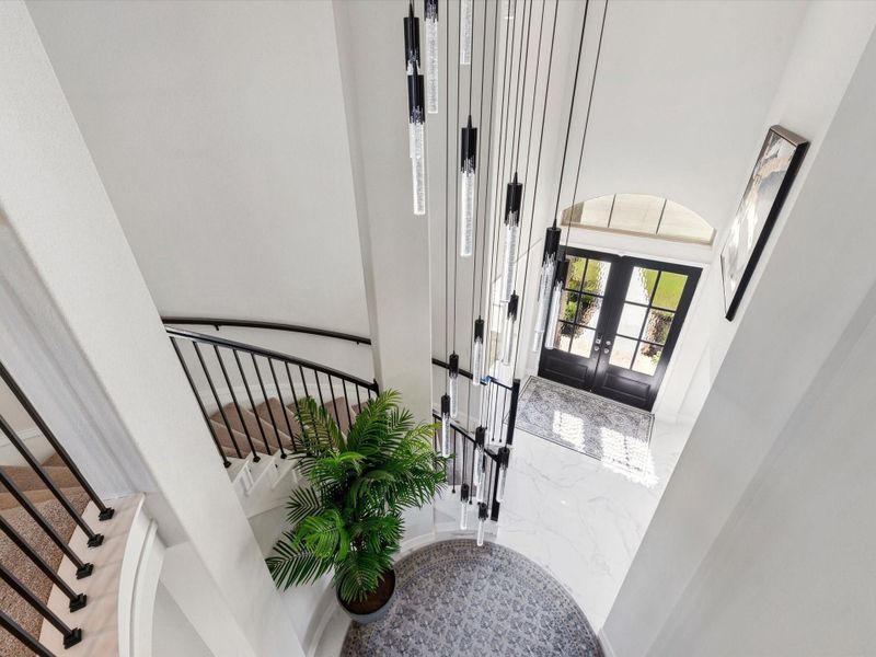 Stunning, right? This chandelier sparkles in the dark like diamonds!  Bonus! You can check out who's at the door from upstairs.