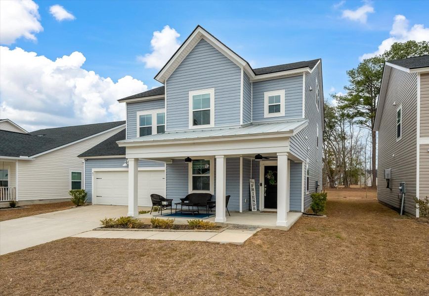 Front exterior of a new home in Limehouse Village: Arbor Series, Summerville, SC, highlighting curb appeal (Image 2). Front exterior of a new home in Limehouse Village: Arbor Series, Summerville, SC, highlighting curb appeal (Image 2).
