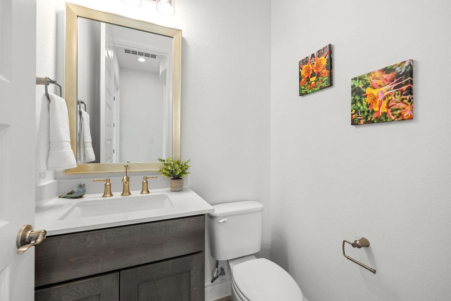 Bathroom with toilet and vanity