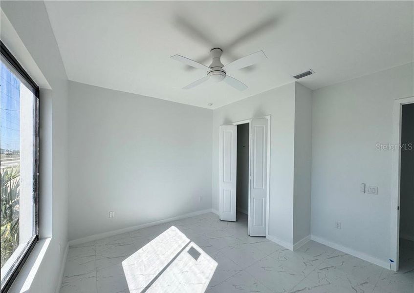Spacious, unfurnished interior of a new home in , Cape Coral (Image 22).