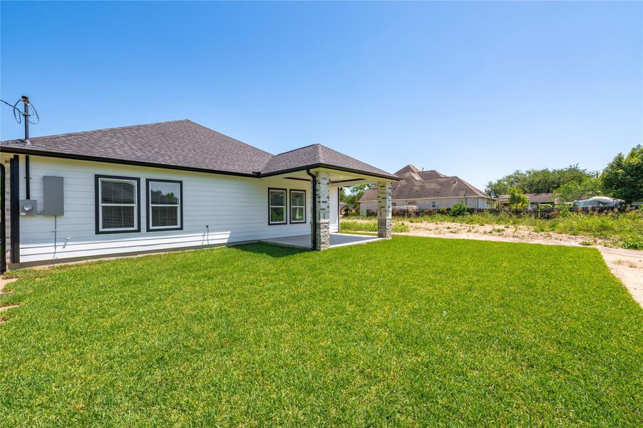 Exterior details and patio area of a home in , Houston (Image 3).