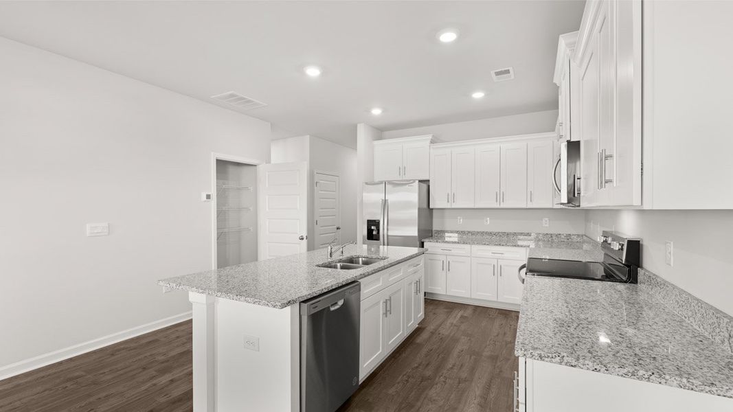 Representative furnished interior of a home built from the Sullivan by D.R. Horton in Byrd Village, Graniteville (Image 6).
