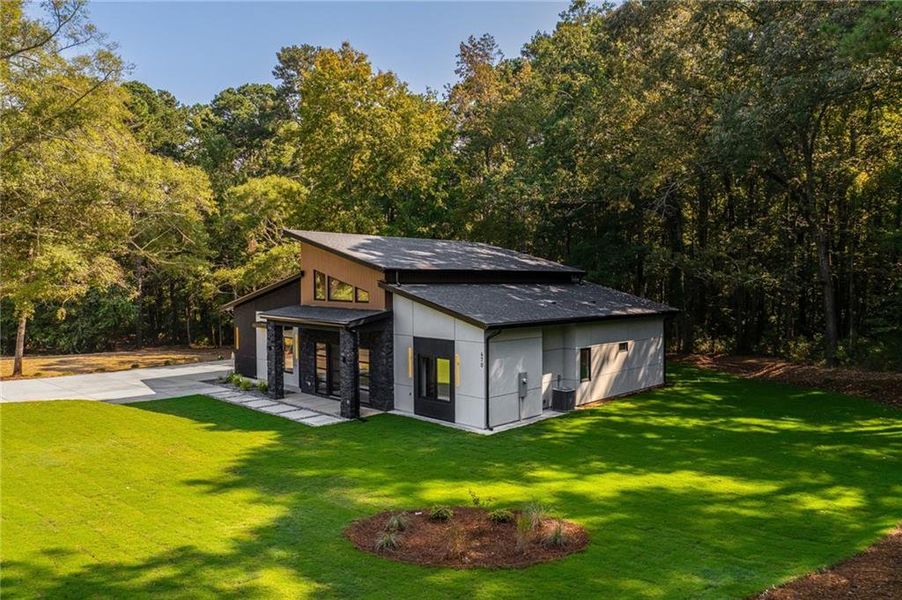 Front exterior of a new home in , Winder, GA, highlighting curb appeal (Image 31).