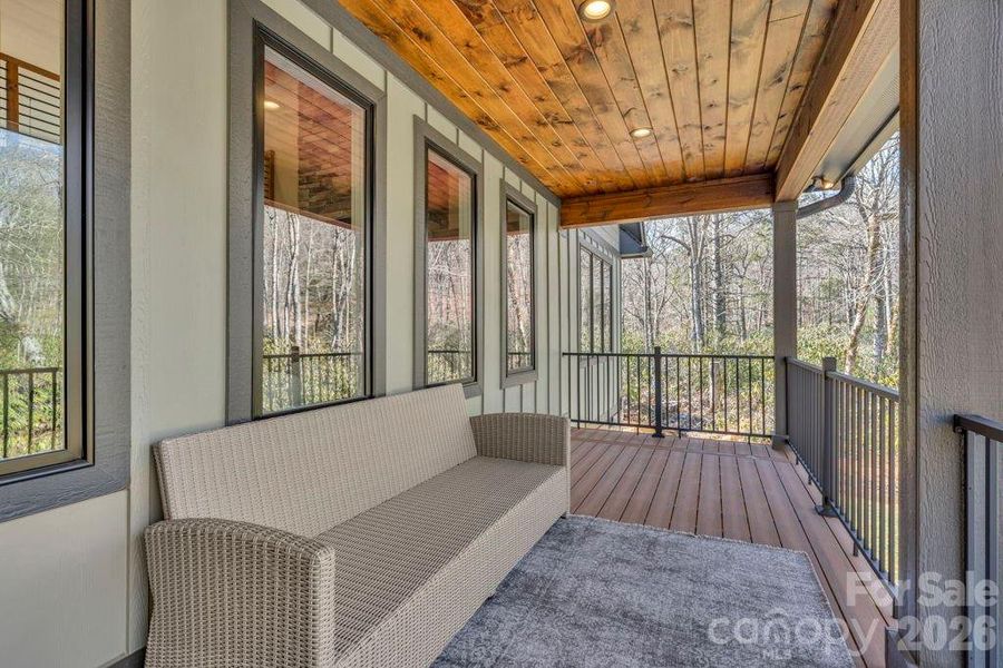 Covered back deck with river views Covered back deck with river views
